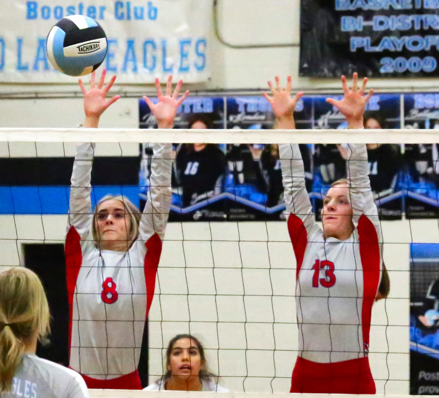 Alba-Golden Lady Panthers Lainey Wright and Cacie Lennon rise to block Como-Pickton.